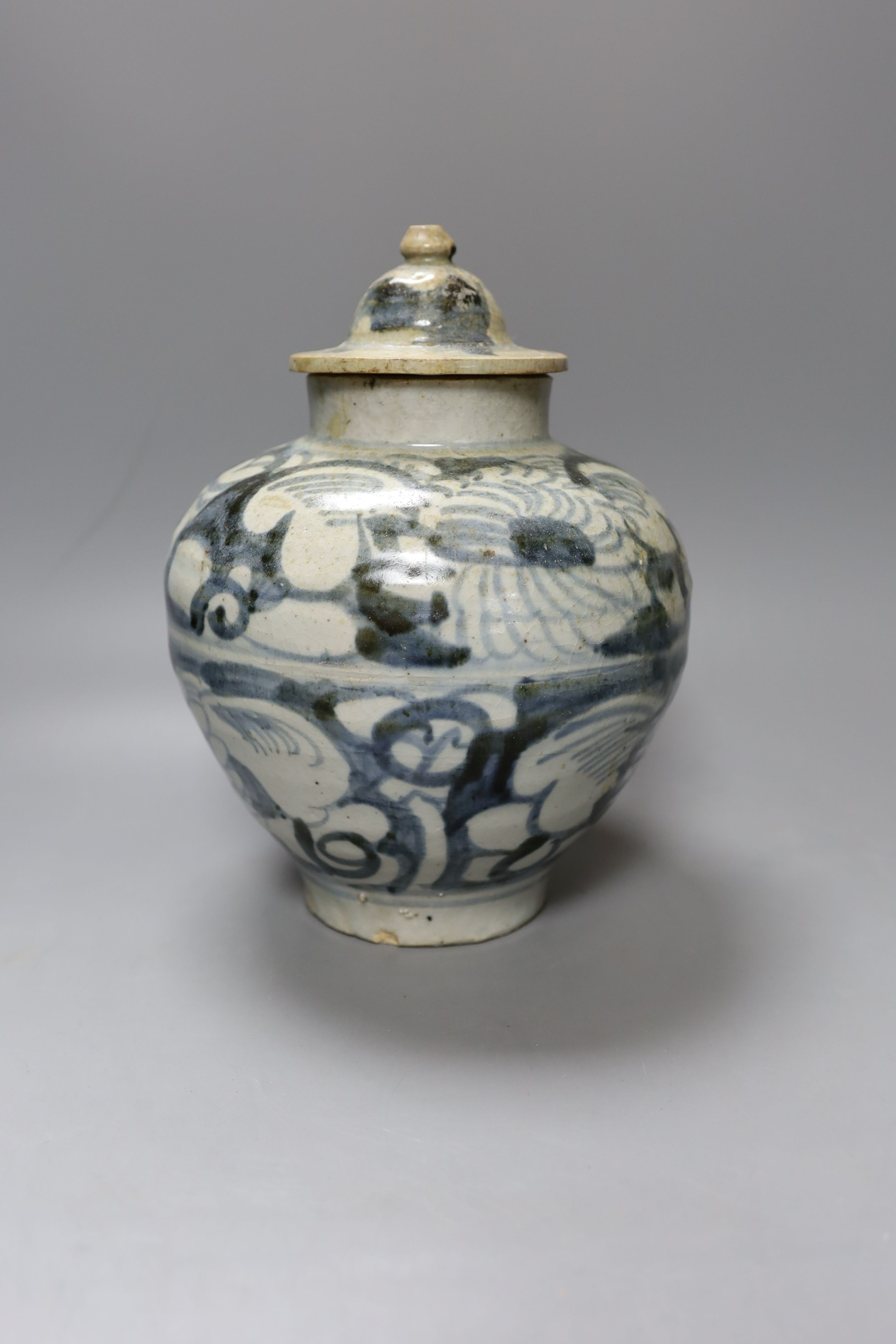 A South East Asian blue and white porcelain jar and cover, possibly Sawankhalok 26cm